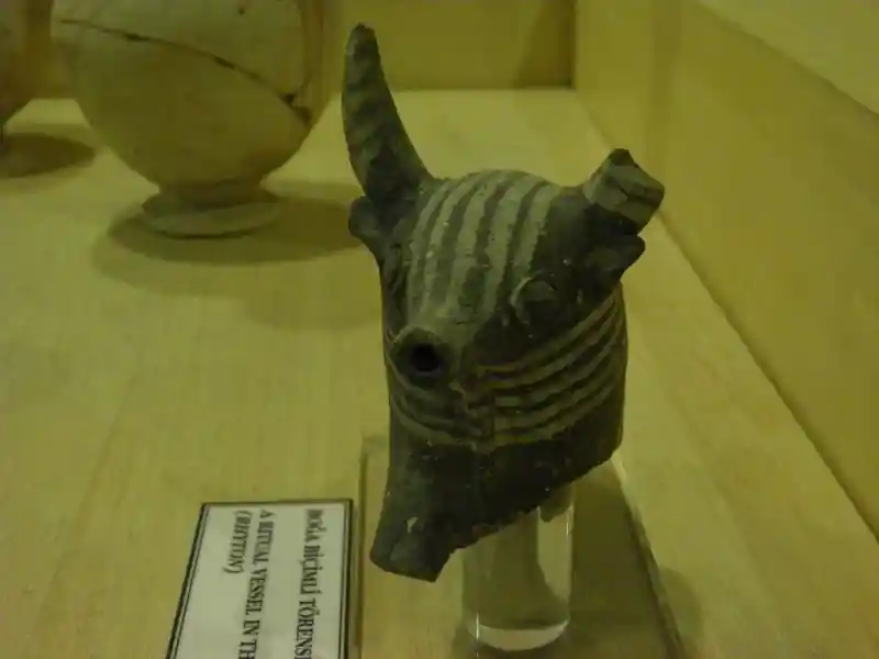 A figure of an animal with horns and stripes